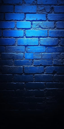 Dark Blue Illuminated Brick Wall BackgroundTexture. Empty Brickwall With Space For Your Design.の素材