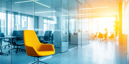 Modern Glass Walled Office Interior, Yellow Chair In Foreground, Blurry Businesspeople, Sunsetの素材