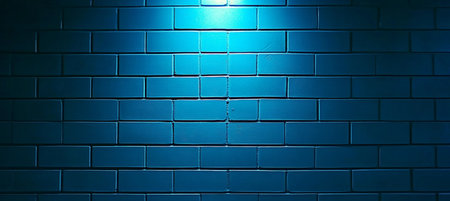 Illuminated Blue Brick Wall at Night, Urban Brick Texture, Empty Space with Dramatic Backdropの素材