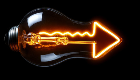 Glowing Light Bulb With Rising Arrow Illustrating Increasing Electricity Prices And Energy Costsの素材