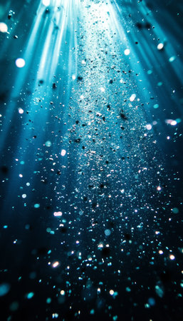 Abstract Underwater Sunlight, Rays of Light Pierce Through Ocean Depth with Bubbles, Blue, Serenityの素材