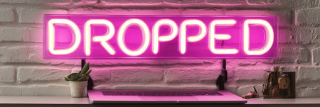 Laptop and Vibrant Neon Dropped Sign Modern E-Commerce, Order Status, and Online Shopping Conceptの素材