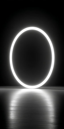 Glowing neon circle on dark background, minimalist abstract concept with illuminated ringの素材