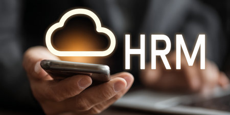 Cloud Based Human Resource, HRM, Management System Accessed Via a Mobile App by Businessmanの素材