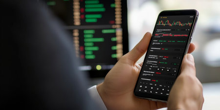 Crypto Trader Investor Analyzes Stock Market Charts On Phone App For Financial Tradingの素材