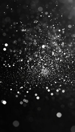 Abstract Swirling White Particles on Black, Festive Christmas Lights Background with Bokeh Effectの素材