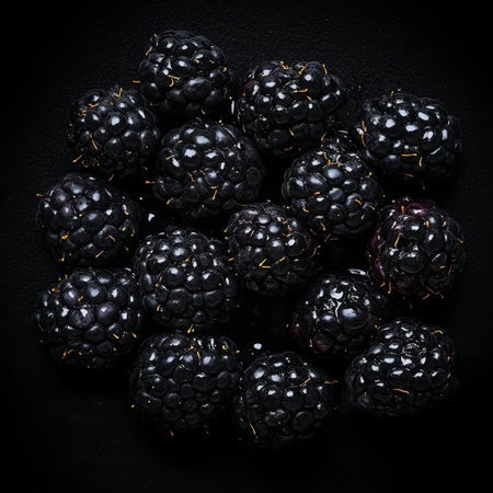 Fresh, Ripe Blackberries Close Up, Rich Dark Color and Texture, Isolated on Black Backgroundの素材