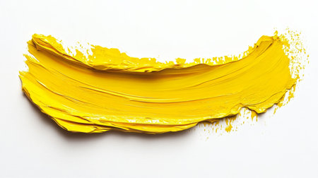 Vibrant Yellow Brushstroke, Textured Oil Paint Swipe Isolated on White Background With Copy Spaceの素材