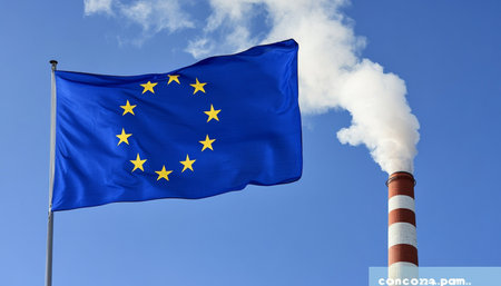 European Union Flag Waving Next To Industrial Smokestack Emitting Pollution, Climate Change Concept.の素材