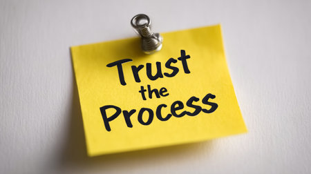 Yellow Sticky Note With Push Pin, Isolated On White Background, Showing Trust The Processの素材