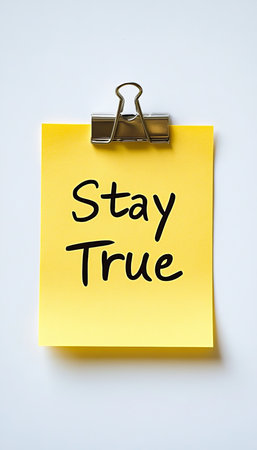 Motivational Yellow Sticky Note With Stay True Message, On White Background, Isolated.の素材