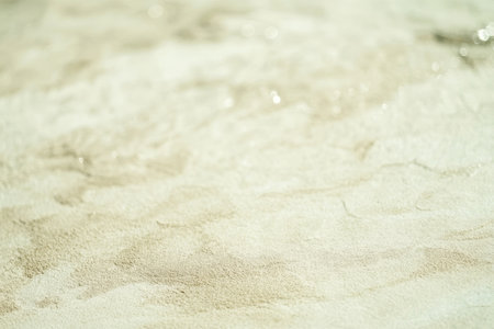 Subtle Beige Backdrop with Light Pastel Texture in an Abstract and Calm Artistic Background Sceneの素材