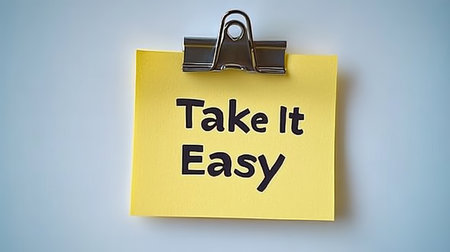 Yellow Sticky Note With The Words Take It Easy On A White Background, Reminder, Motivationの素材
