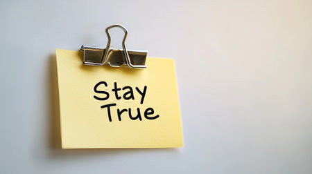 Yellow Sticky Note With Stay True Message, Isolated On White Background, Motivation Concept Imageの素材