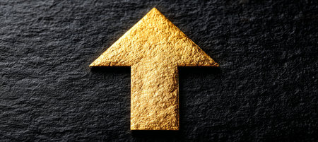 Golden Arrow Symbol on Dark Background Signifying Development, Advancement, and Achievement Growthの素材