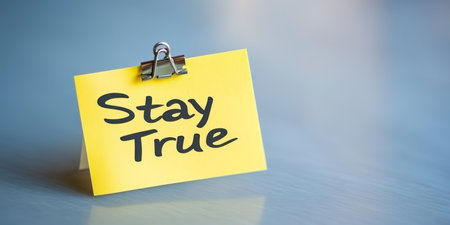 Stay True Note. A Bright Yellow Sticky Note With the Inspirational Message Stay True.の素材
