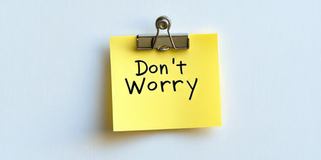 Yellow Sticky Note With Don t Worry Text On A White Background, Offering Comfort and Reassurance.の素材