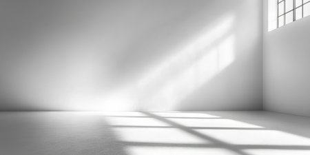 Bright and Airy Minimalist White Room Interior bathed in Natural Sunlight with Soft Shadow Playの素材
