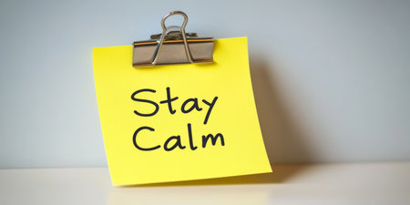 Yellow Sticky Note With Stay Calm, Advice To Relieve Workplace Stress On White Backgroundの素材