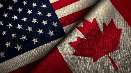 United Front Merged USA and Canada Flags Representing Strong Friendship and Diplomatic Unityの素材