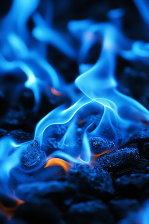 Ethereal Blue Flames Dancing Amidst Darkness, Capturing Fire s Energy and Dynamic Motion in Artの素材