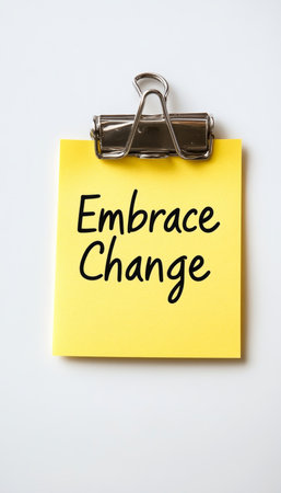 Stationery Note on Clip Highlighting the Importance of Embracing Change and Positive Adaptationの素材