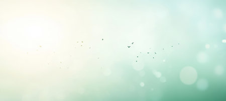 Elegant Bokeh Background with Soft Green Tones and Gentle Light for Relaxing and Calming Projectsの素材