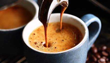 Aromatic Espresso Pours into a Beautiful Blue Cup, Offering Rich Flavors That Awaken the Sensesの素材