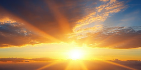 Stunning Sunrise Over Tranquil Landscape, Vibrant Clouds and Sunbeams Creating a Beautiful Sceneの素材