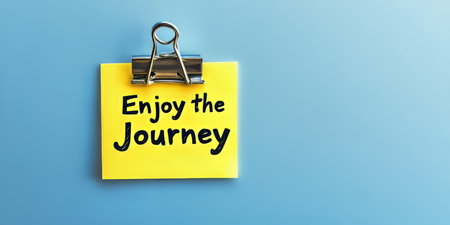 A Yellow Note with an Inspirational Message for a Better Life on a Bright Blue Backgroundの素材