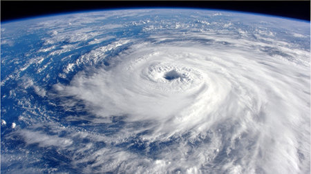 Aerial View of a Powerful Hurricane Over Earth, Showcasing Intense Cloud Formations and Storm Furyの素材