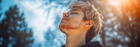 Peaceful Young Man Meditating in Tranquil Forest, Embracing Nature s Serenity and Finding Inner Calmの素材
