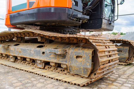 Heavy Machinery Tracks on Construction Site, Powerful Excavator Equipment Close-up View