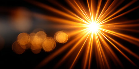 Golden Sunlight Burst with Magical Bokeh Lights Creating a Dreamy Atmosphere and Radiant Glowの素材