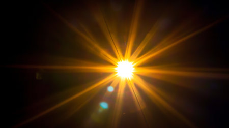 Stunning Golden Sunbeam Illuminating A Dark Backdrop, Creating A Captivating Solar Burst Effectの素材