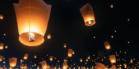 Sky Lanterns Illuminating the Night. A Glowing Celebration of Tradition and Hope. Light Up Sky.の素材