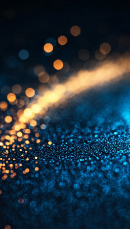 Dramatic Midnight Blue Magic Sky with Glittering Golden Stars and Swirling Cosmic Bokeh Effectsの素材