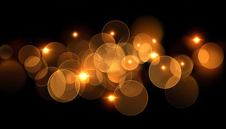 Golden Abstract Shimmering Bokeh with Blurred Glares on Black Background for Festive Designsの素材