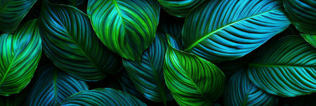 Lush Tropical Foliage Backdrop Featuring Vibrant Green Leaves with Deep Veins for Exotic Elegance.の素材