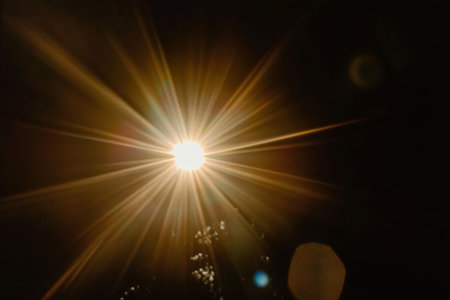 Stunning Radiant Sun Flare Bursting Against Dark Backdrop, Creating Breathtaking Light Effectsの素材