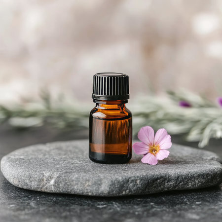Amber Apothecary Oil Bottle with Pink Flower on Stone Surface, Captivating Holistic Wellbeing Artの素材