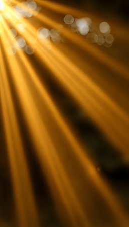 Radiant Gold Rays Burst Through the Sky, Illuminating the Landscape with Warm, Bright Light Flaresの素材