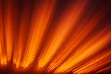 Vibrant Golden Sun Rays Radiating Outward, Forming a Beautiful Sunburst Pattern on Dark Backgroundの素材