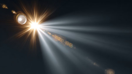 Stunning Radiant Beam Illuminating Dark Texture Backdrop with Burst Effect and Lens Flare Overlayの素材