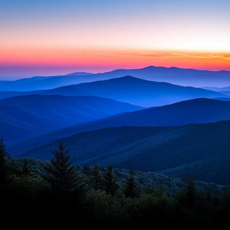 Breathtaking Sunset Over Majestic Mountain Ranges with Vibrant Colors and Serene Atmosphereの素材
