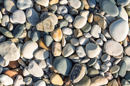 Smooth Beach Stones Texture Background, Natural Colors, Sea Shore Pebbles Surface.