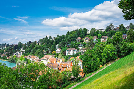 Picturesque Bern, Switzerland A Stunning View of the Cityscape and Lush Greenery on a Sunny Day