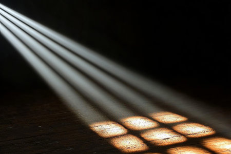 Dramatic Sunlight Beams Cutting Through Darkness, Revealing Dusty Wooden Floor Patterns in Illusionの素材