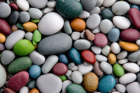Vibrant Naturally Polished Stone Pebbles in Aesthetic Arrangement on Colorful Background Displayの素材