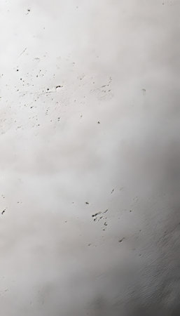 Weathered Gray Plaster Wall with Stains and Textures, Aged Concrete Surface with Rustic Appealの素材